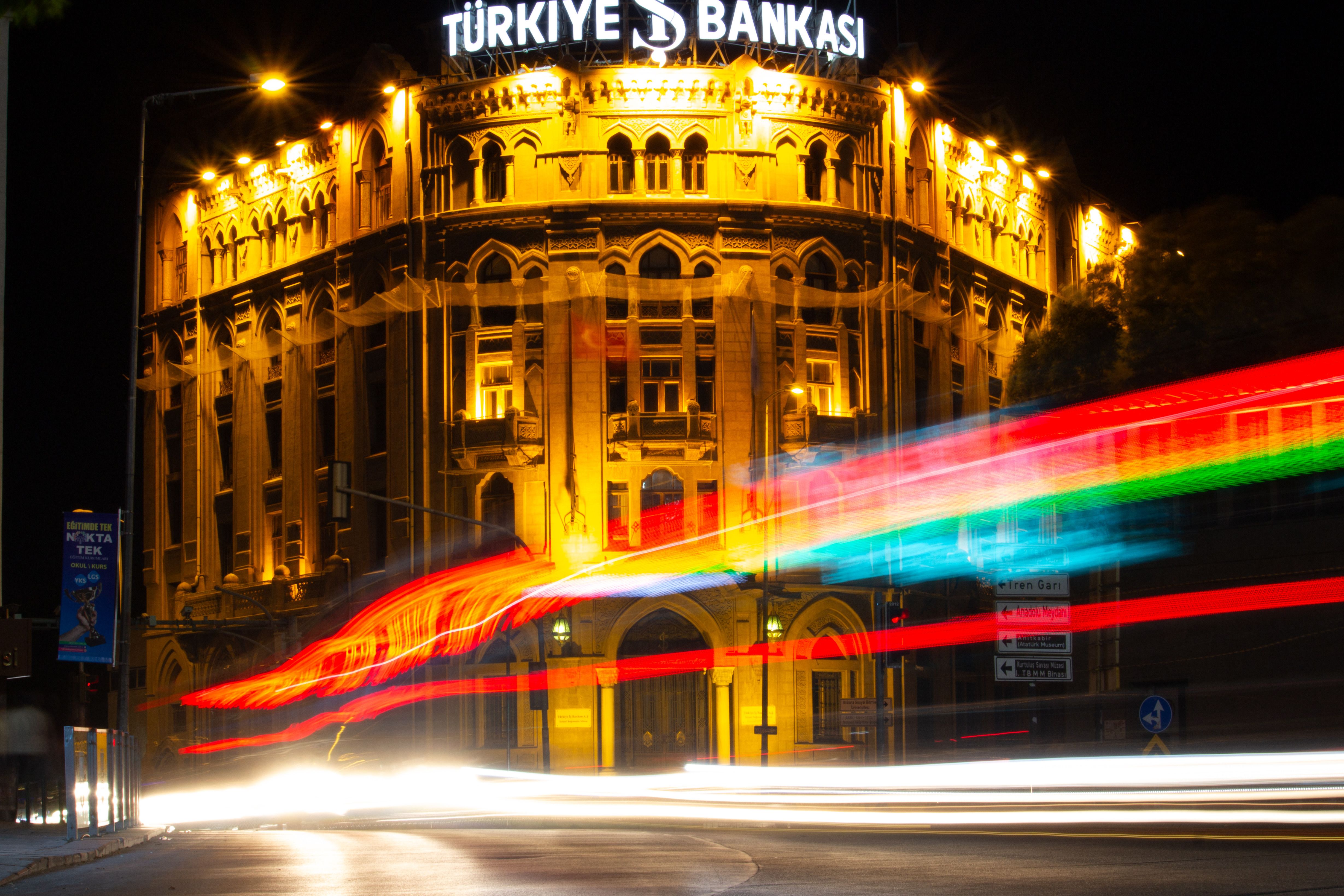 Night view of Türkiye İş Bankası Building with light trails · Free ...