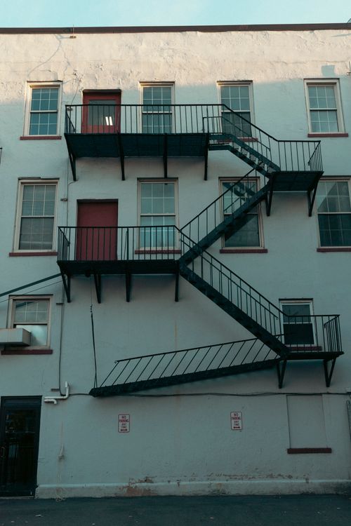 Free A picturesque fire escape on a historic building facade in Rochester, New York. Stock Photo