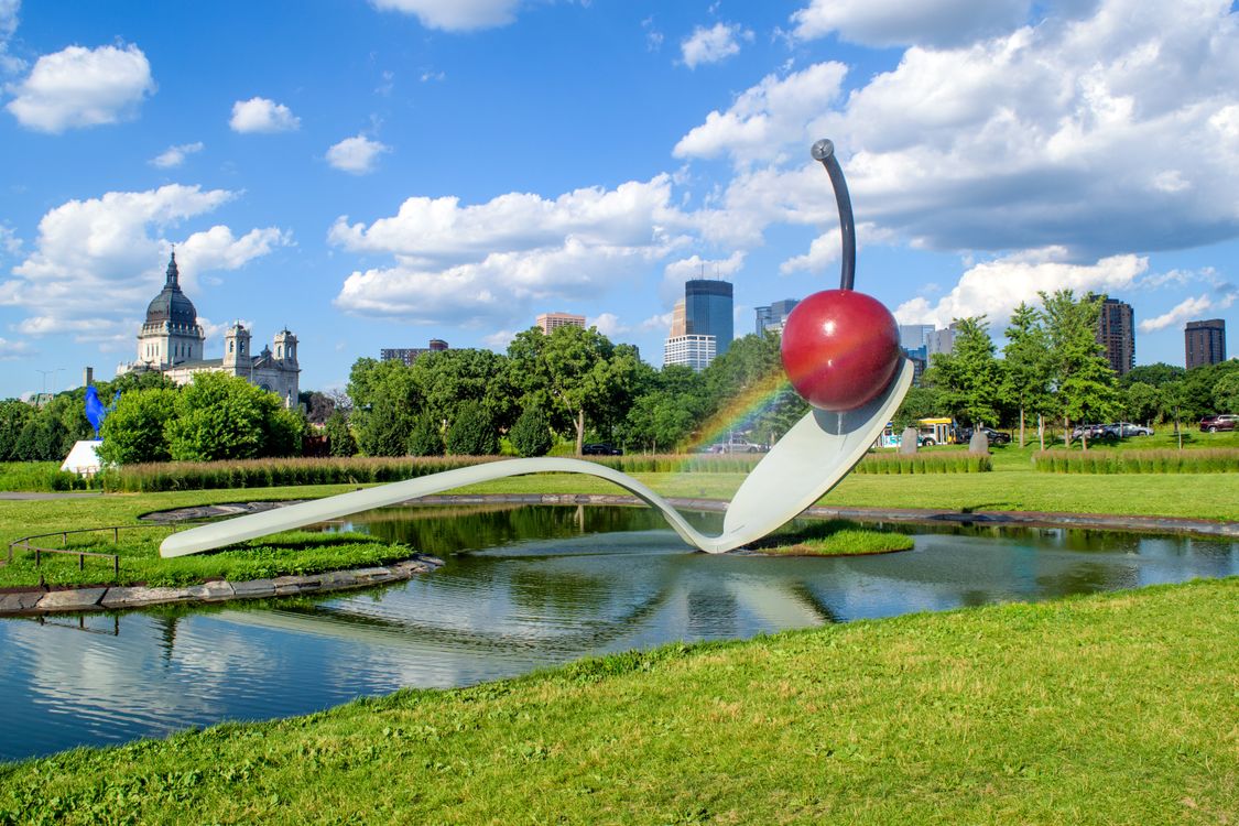 Spoonbridge and Cherry sculpture at Minneapolis Sculpture Garden with city skyline
