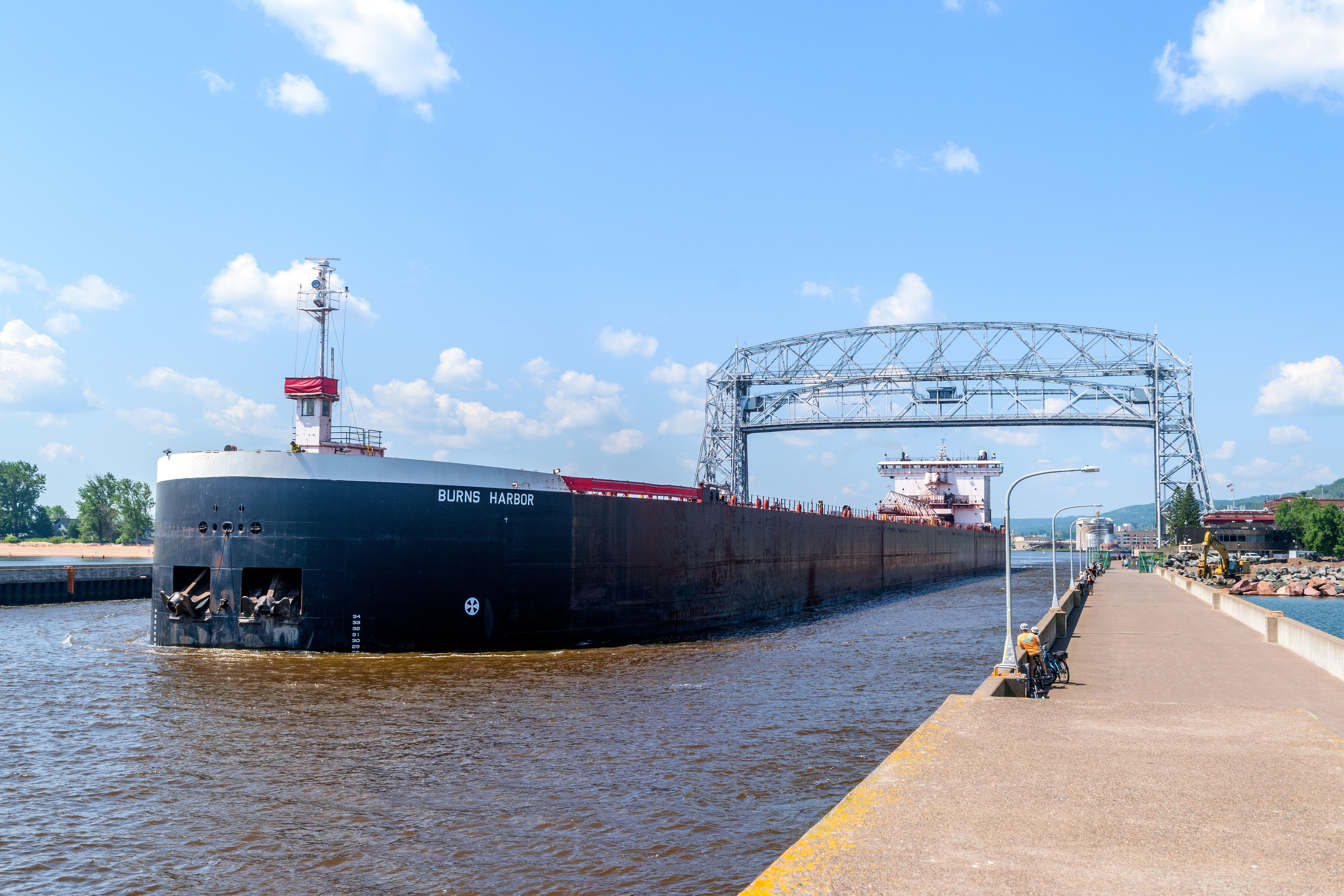 Cargo ship 'Burns Harbor' passes under the Aerial Lift Bridge in Duluth, Minnesota.