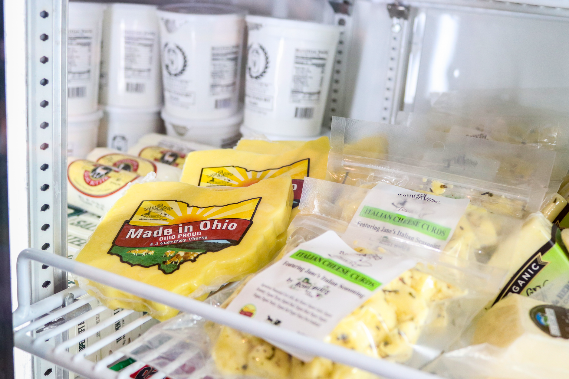 Variety of fresh cheeses including ricotta and cream cheese
