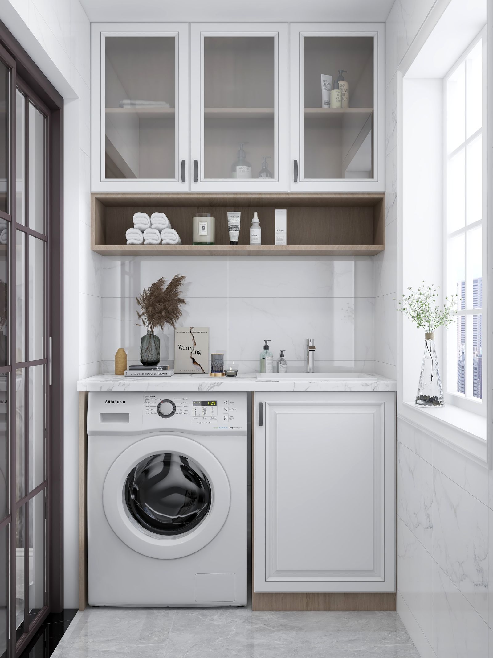 Bright modern laundry room with cabinetry and natural light