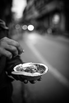 A person enjoying traditional Nepalese street food in Kathmandu's vibrant streets.