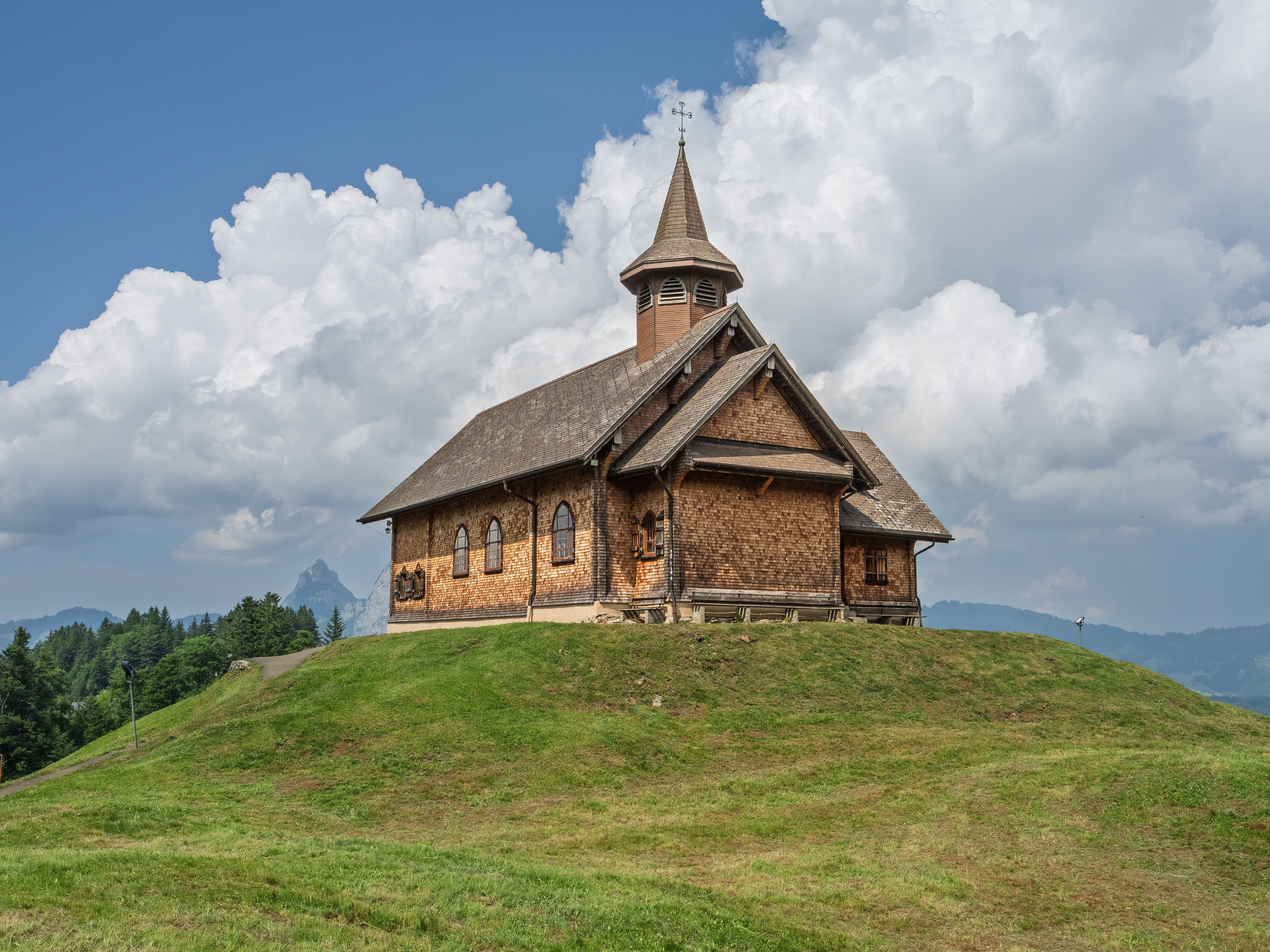 Rustic Wooden Church on a Green Hill · Free Stock Photo