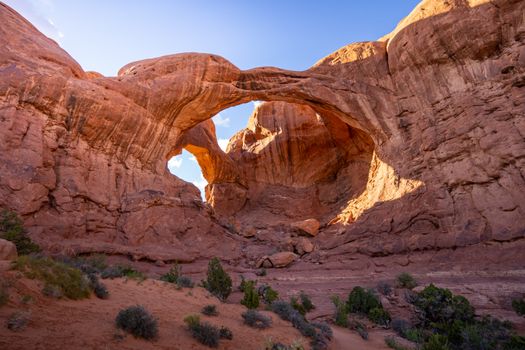 Explore the stunning Double Arch in Utah's Arches National Park, showcasing natural rock formations.