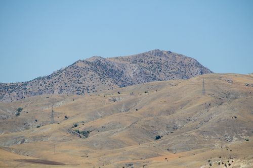 Free Discover the serene mountain landscape in Pertek, Tunceli with clear blue skies. Stock Photo