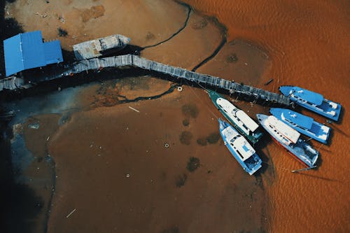 Aerial Photography of Boats in a Dock