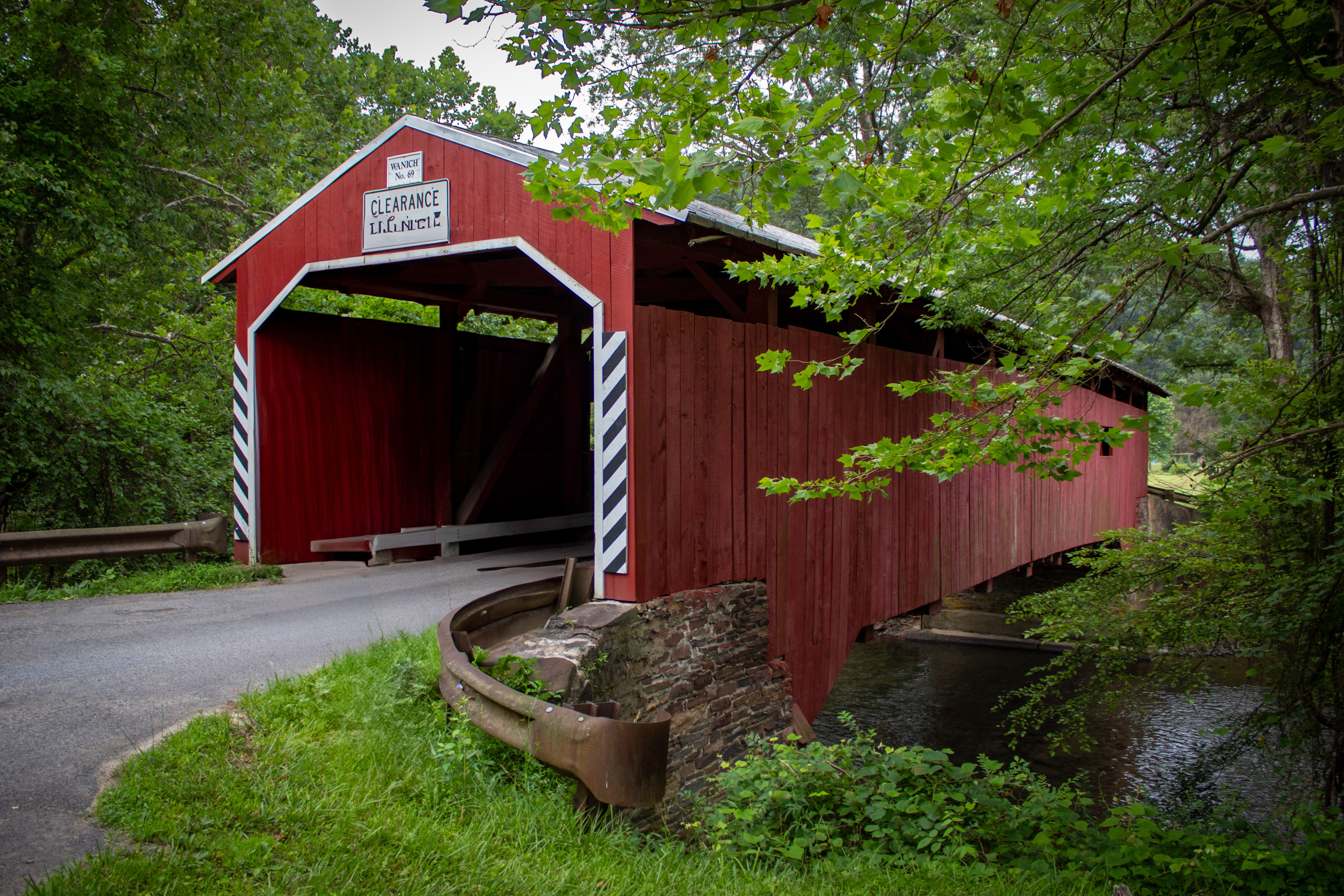 Vintage Red Covered Bridge in Spring Forest · Free Stock Photo