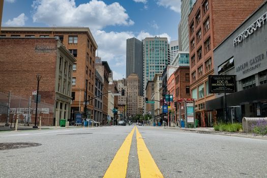 Empty street view in downtown San Francisco highlighting urban architecture and cityscape.