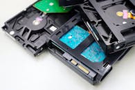 Close-up of Hard Disk Drives on White Surface
