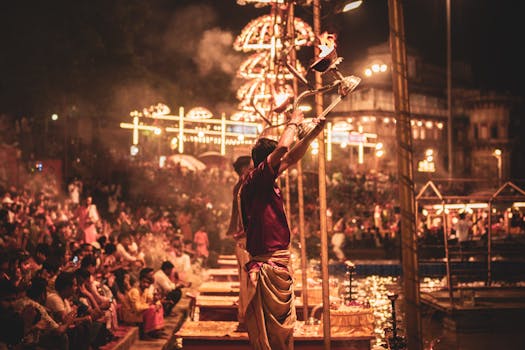 Captivating view of the Ganga Aarti ceremony along the ghats of Varanasi, India, at night.