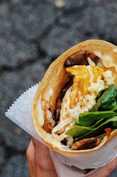 Tasty artisan crepe filled with fresh spinach, cheese, and mushrooms. Perfect street food in Atlanta.