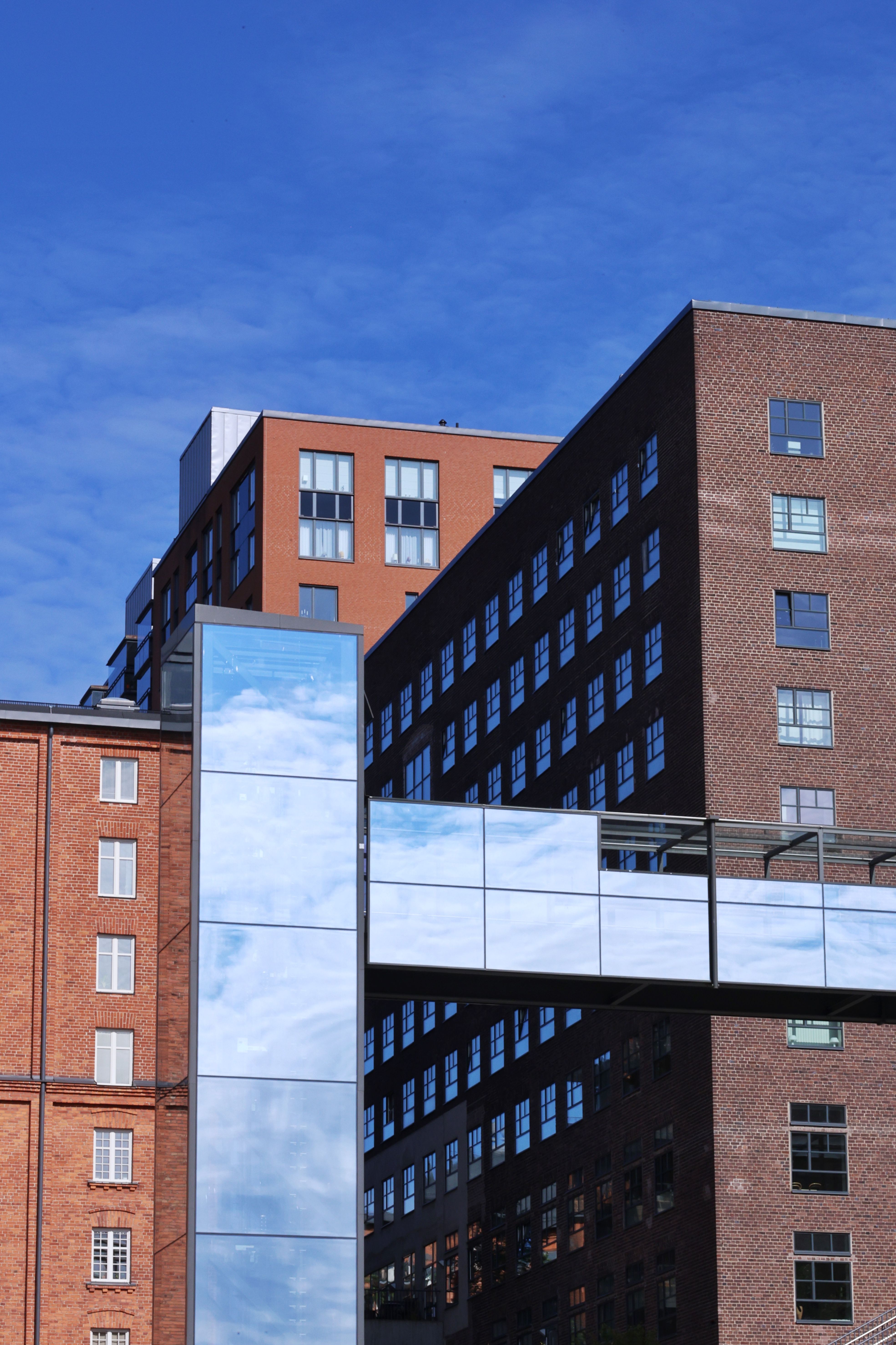 Modern Red Brick Buildings with Sky Reflection · Free Stock Photo