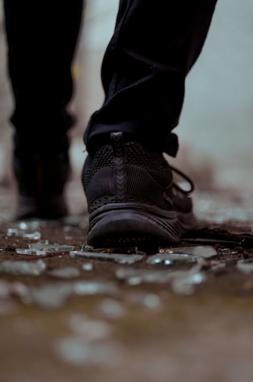 Free Person Wearing Black Shoes and Pants Stock Photo