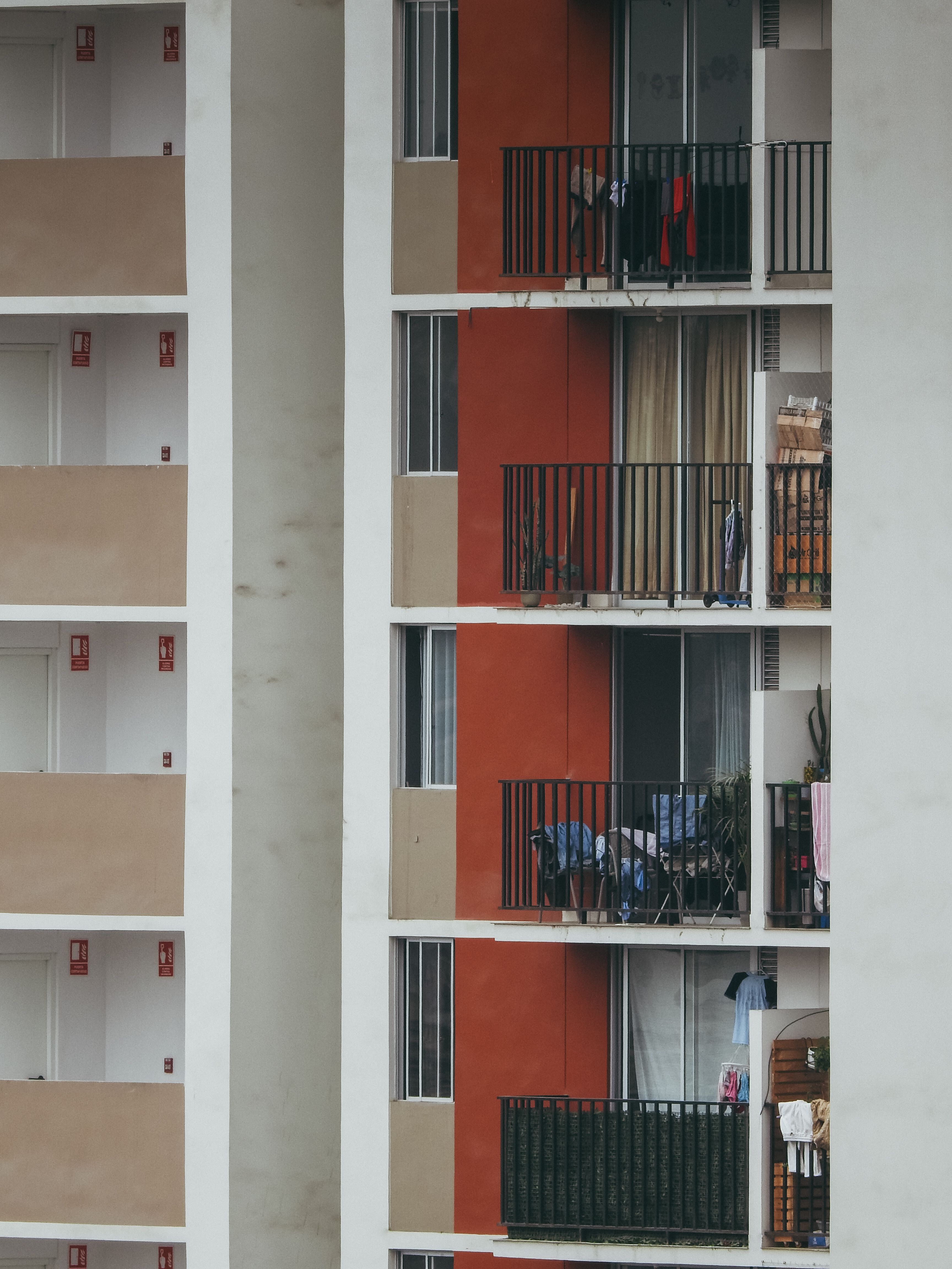 Urban Apartment Building Facade with Balconies · Free Stock Photo