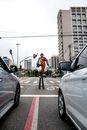 Person Standing in the Middle of the Road