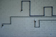 Creative light fixture design on brick wall interior