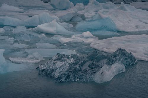 Free A serene view of blue ice floes in Iceland, showcasing nature's icy beauty. Stock Photo