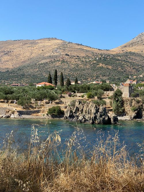 Free Beautiful coastal landscape of Mani Peninsula, Greece with rocky cliffs and Mediterranean flora. Stock Photo