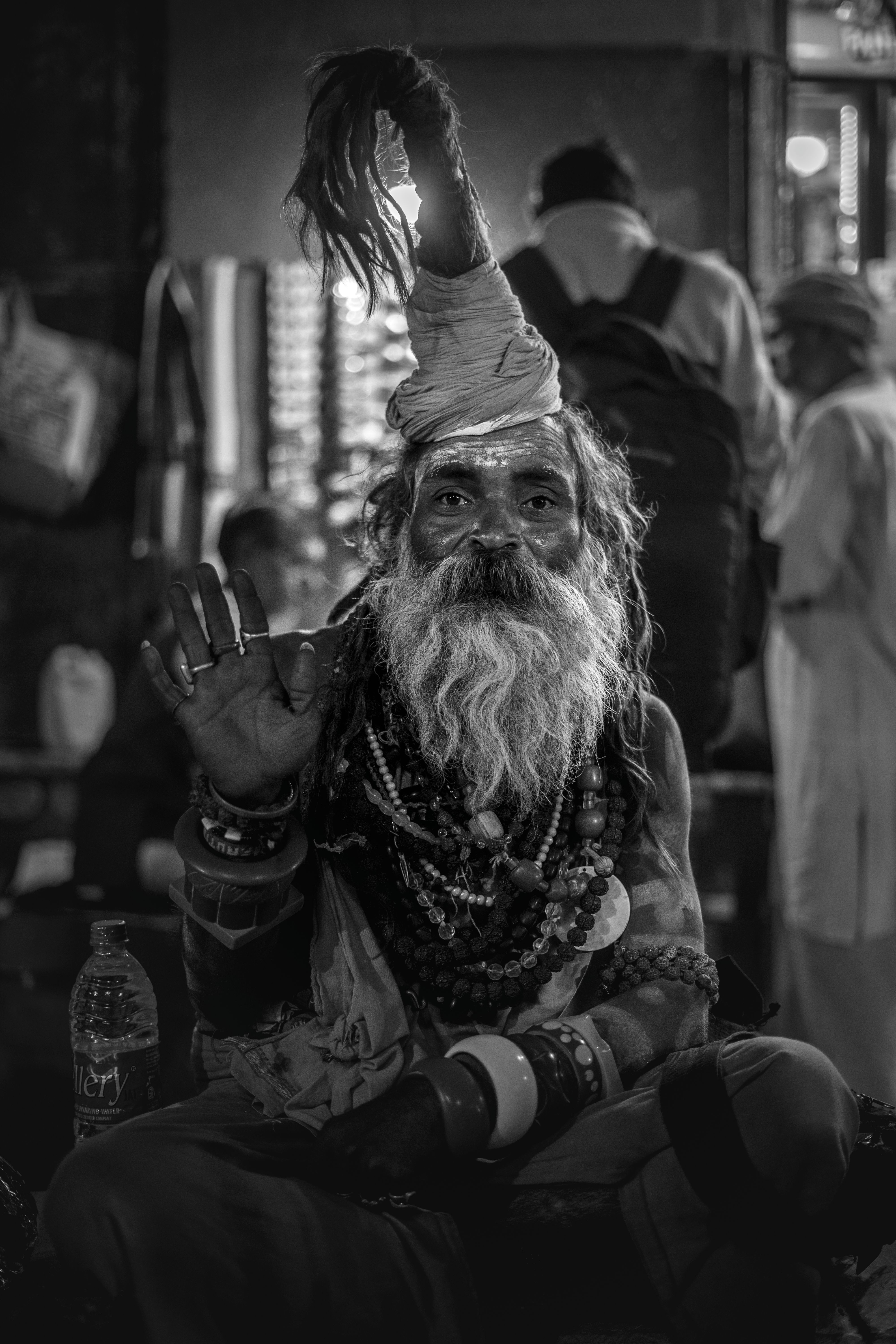 Black and white portrait of a Hindu sadhu in Varanasi, India, showcasing spiritual culture.