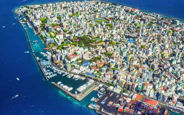 An aerial view of Malé and the blue ocean
