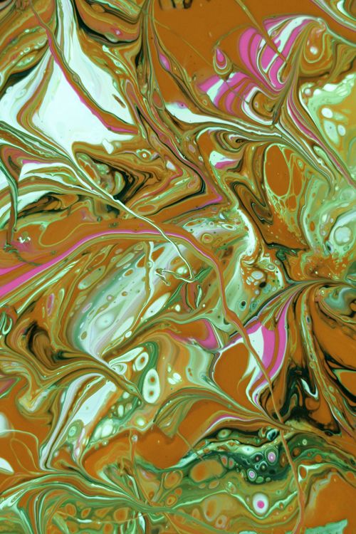 Free Vibrant abstract fluid painting with swirling green and orange tones, ideal for modern art enthusiasts. Stock Photo