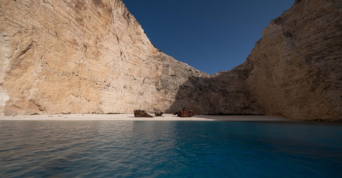 Stunning view of Navagio Beach with its famous shipwreck and turquoise waters in Greece.