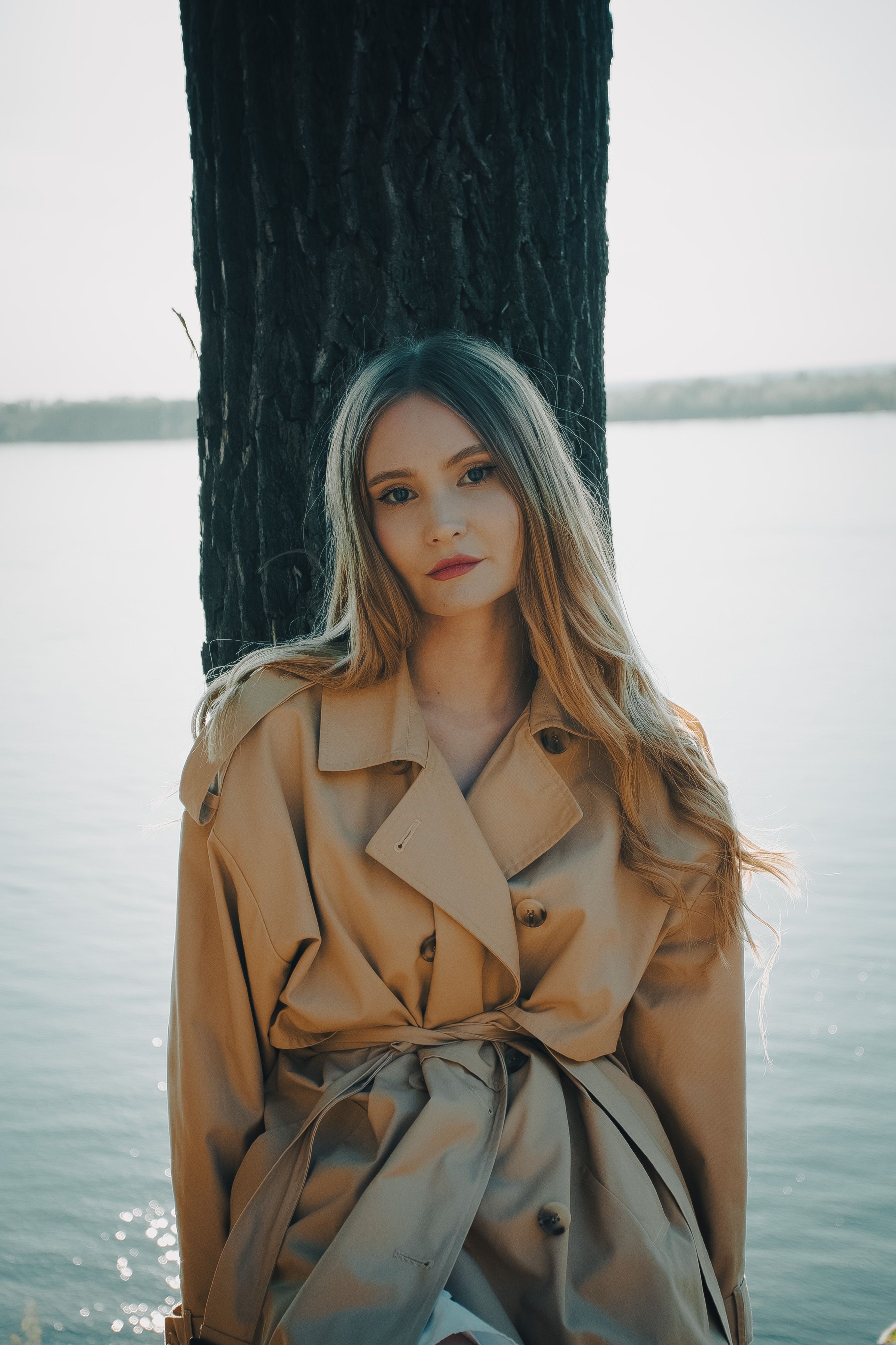 Portrait of Woman in Beige Trench Coat Outdoors · Free Stock Photo