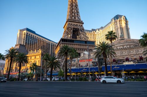 Free View of the Paris Las Vegas Hotel with its Eiffel Tower replica during daytime, showcasing vibrant city life. Stock Photo