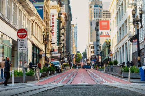 Free Bustling street view of Union Square, San Francisco with iconic architecture and urban life. Stock Photo