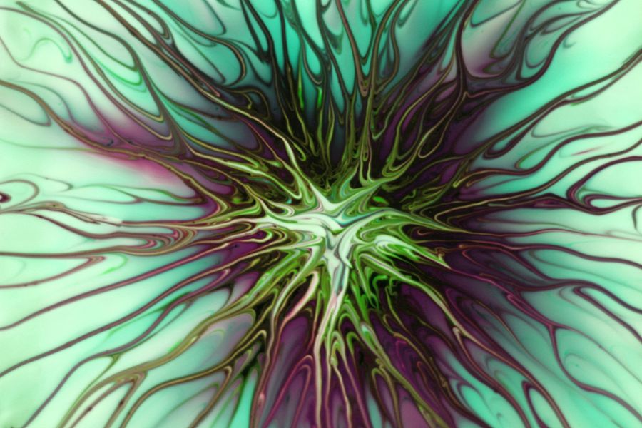 Intricate abstract design featuring swirling liquid patterns in greens and purples.