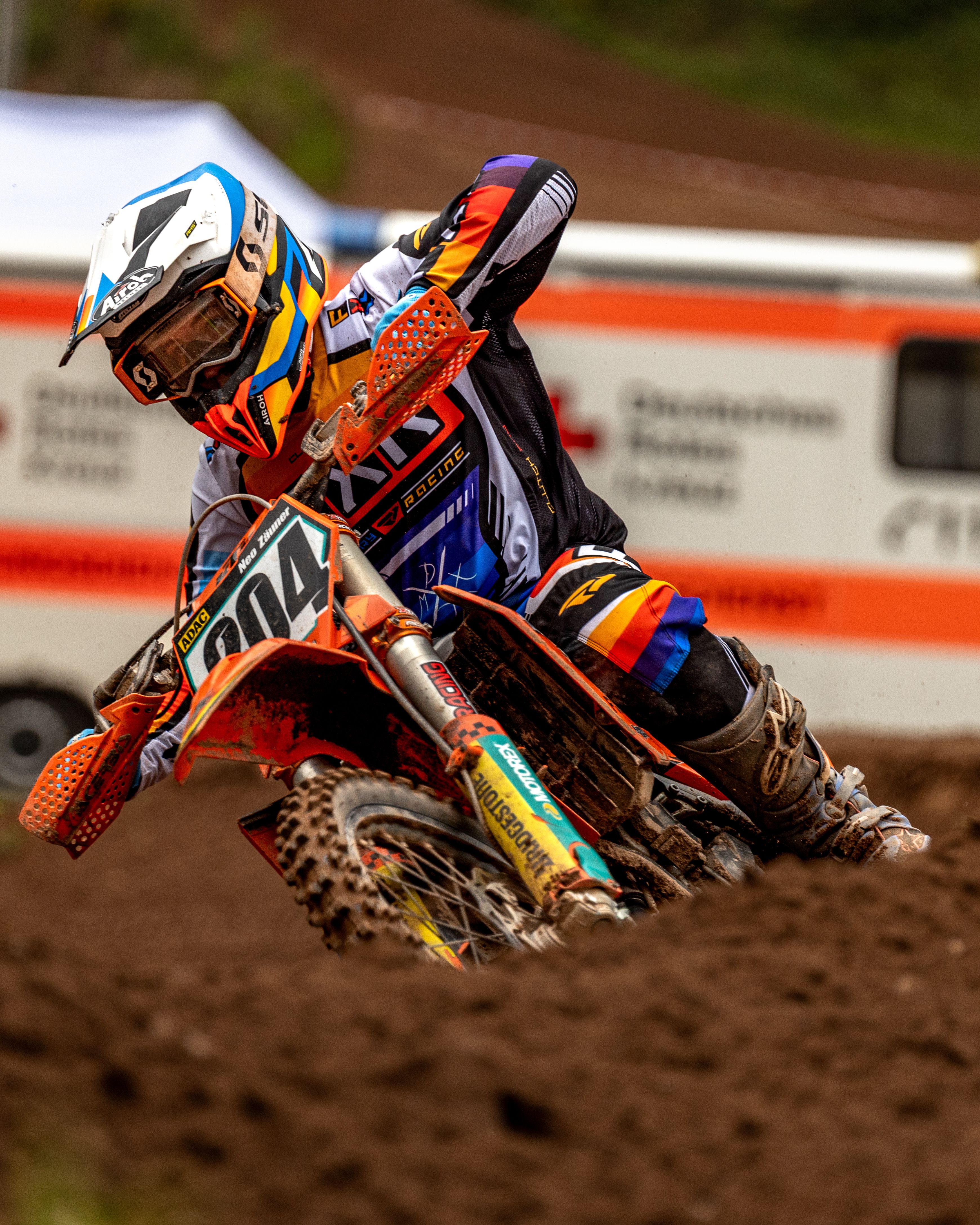 Thrilling Action Shot of a Dirt Bike Racer · Free Stock Photo