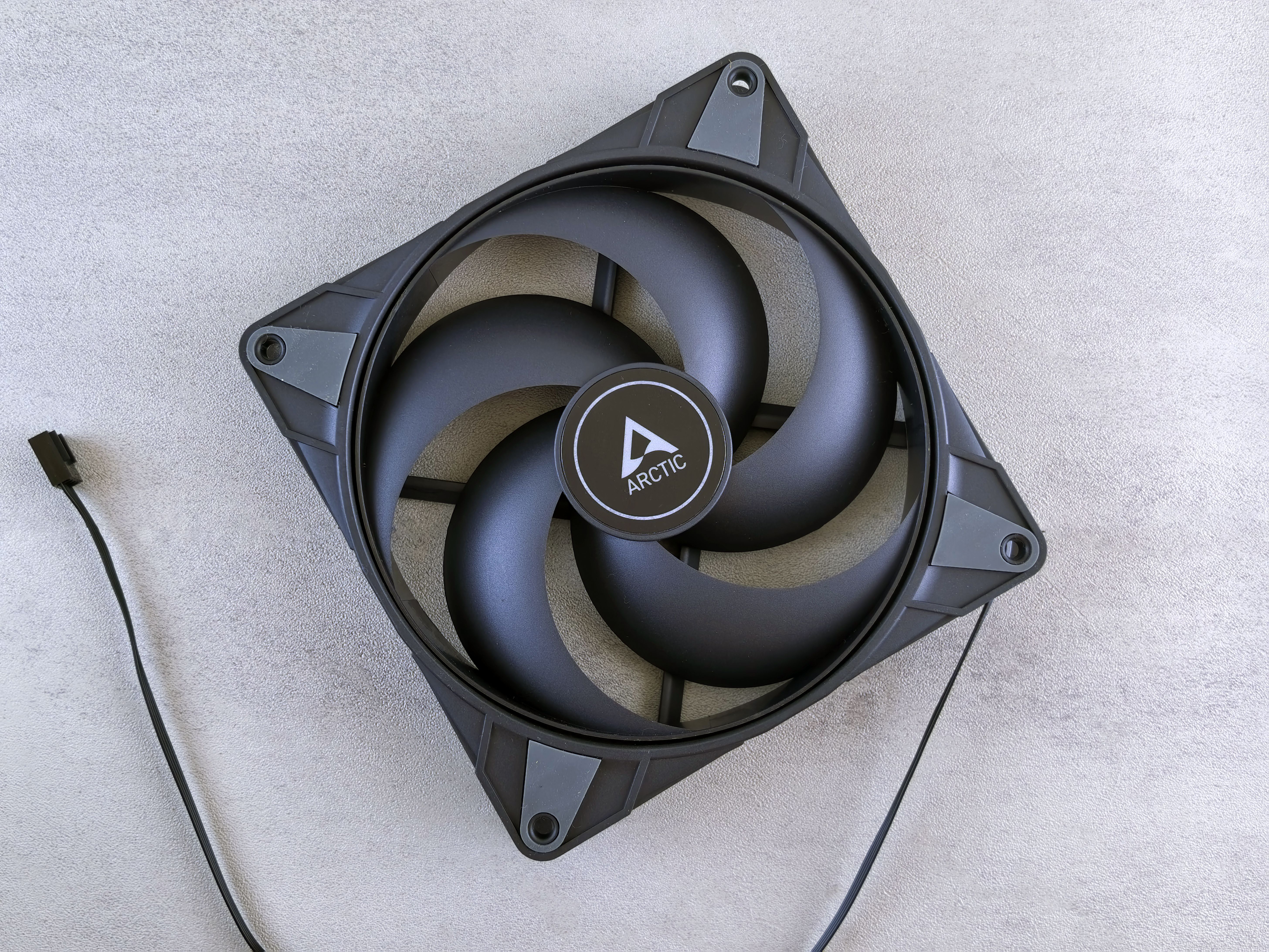 Black Arctic Computer Fan on Grey Background · Free Stock Photo