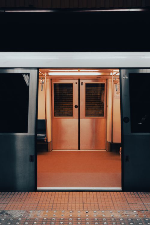 Free Empty subway train with open doors at a Bucharest station. Stock Photo