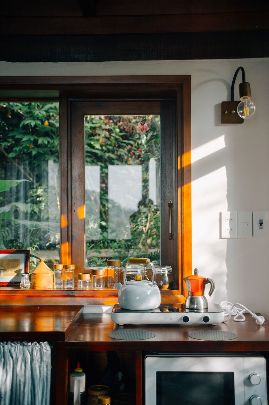 Warm, spotless kitchen with natural light