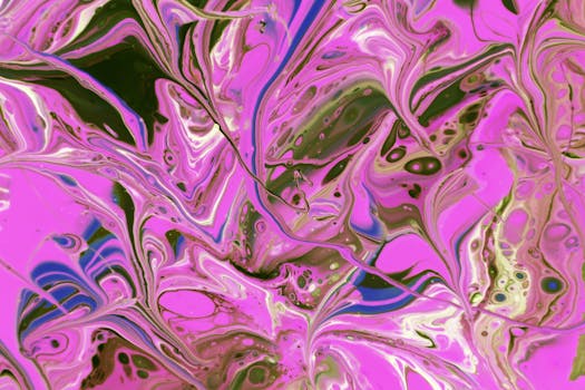 Vibrant abstract fluid art piece with dynamic pink and green swirls creating a mesmerizing pattern.