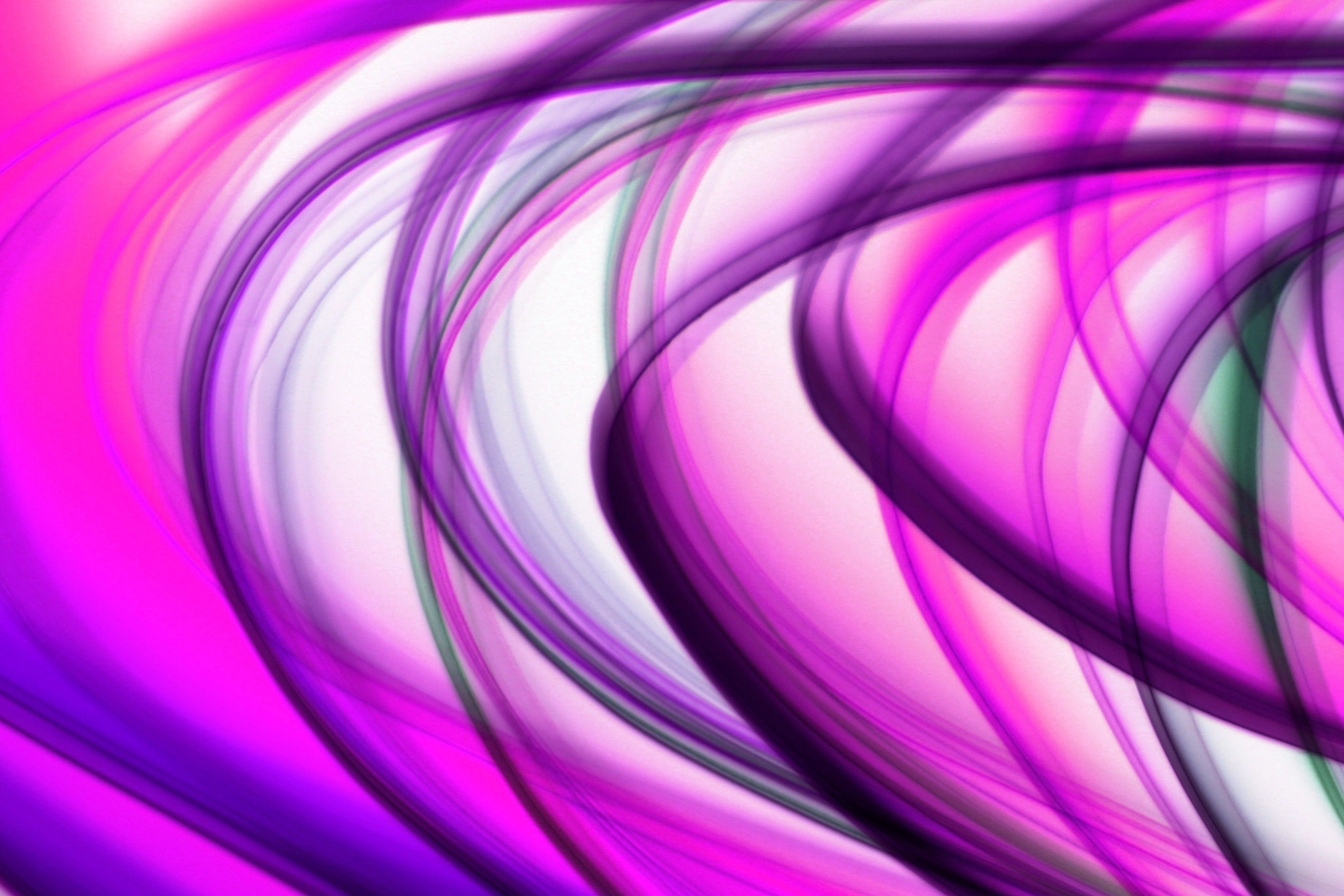Colorful abstract image featuring dynamic pink and purple swirls in a modern artistic style.