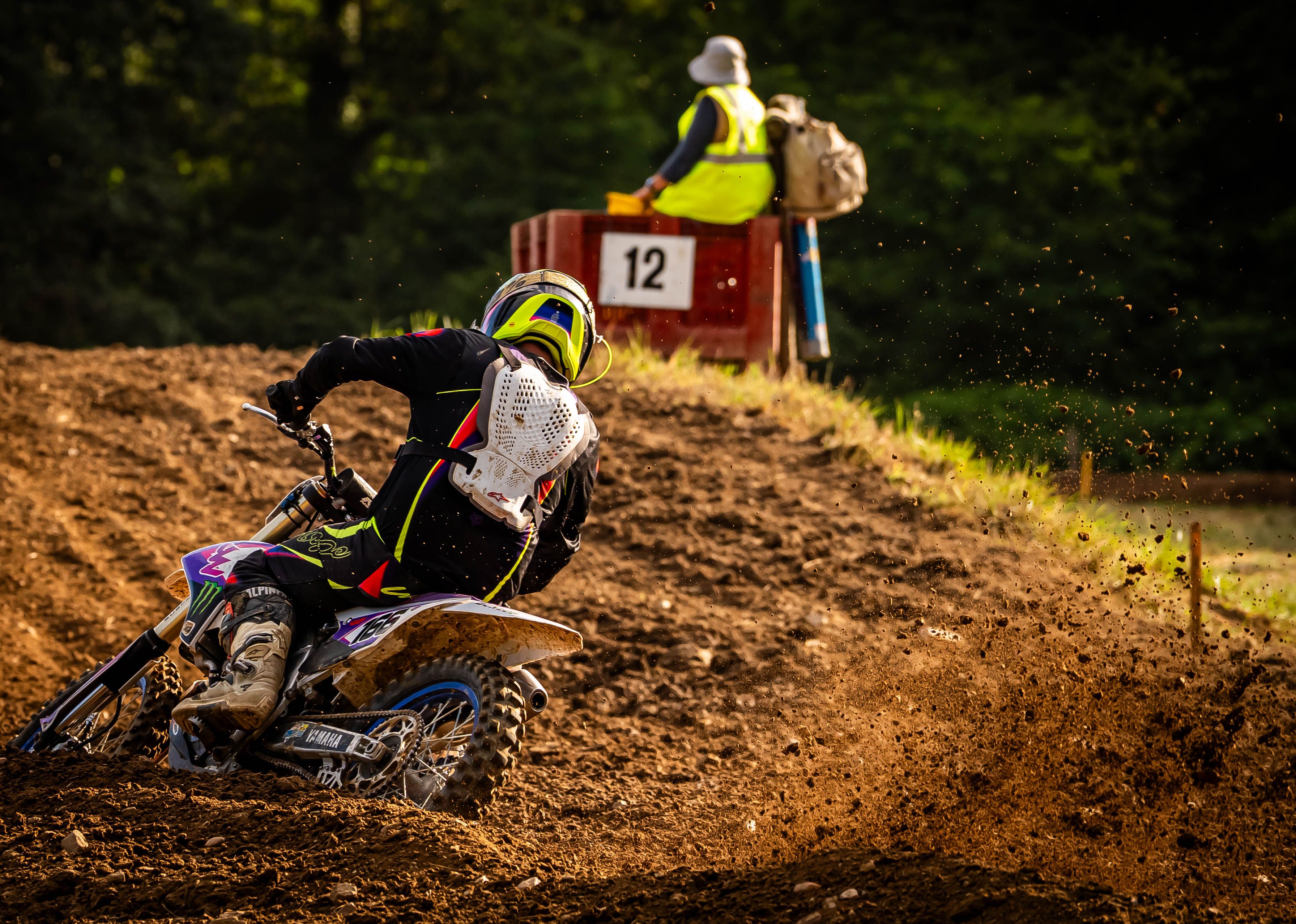 Dynamic Freestyle Motocross Rider on Dirt Track · Free Stock Photo