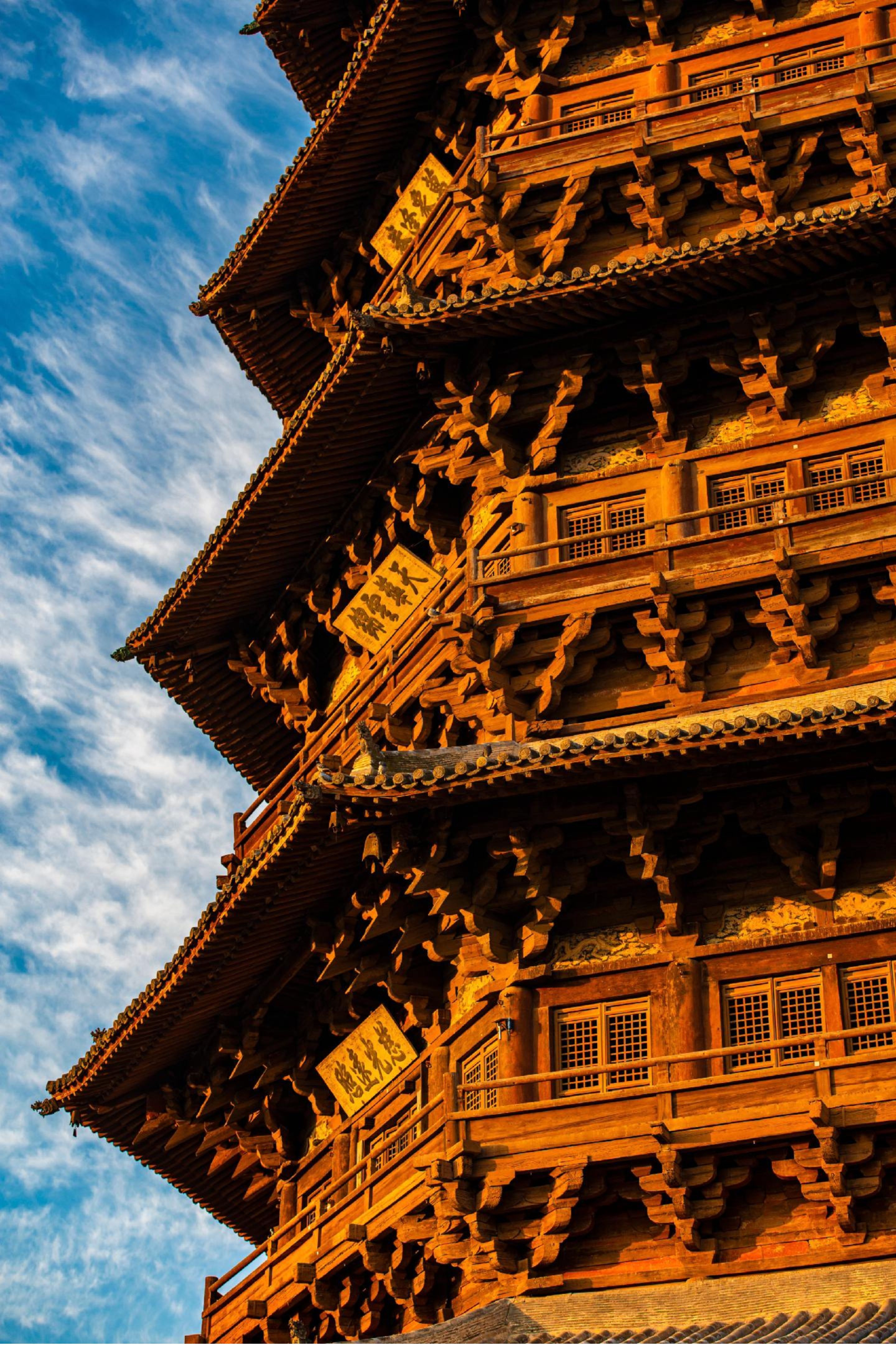 Historic wooden pagoda in Shanxi, China, showcasing rich cultural heritage and architecture.
