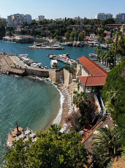 Free A beautiful aerial view of Antalya's marina and coastline showcasing a vibrant harbor and beach. Stock Photo