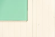 Minimalist Mint Green and Cream Wall Composition