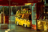 Vibrant Fruit Stand at Outdoor Market Sunset