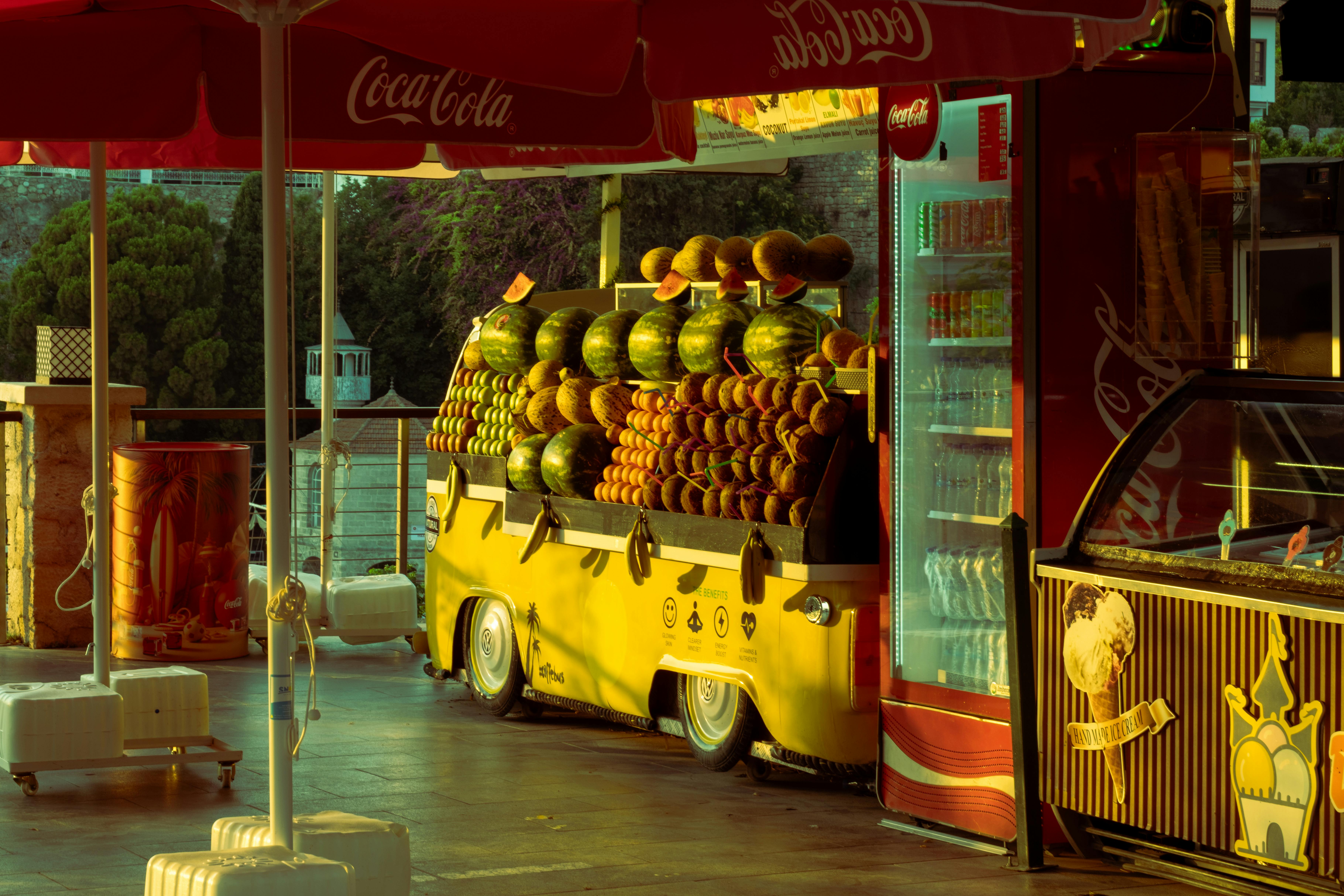 Vibrant Fruit Stand at Outdoor Market Sunset