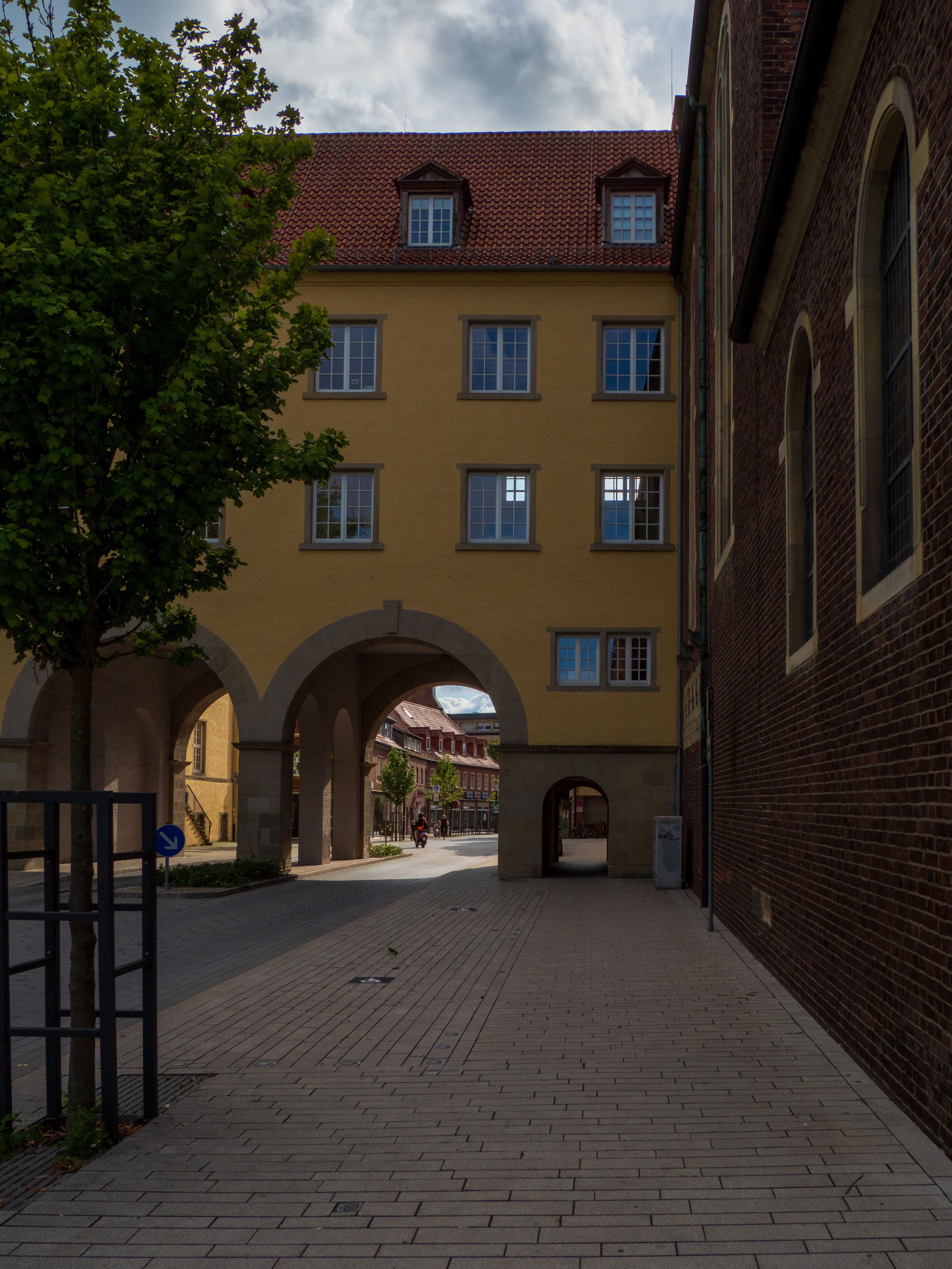 Historic European Street with Archway · Free Stock Photo