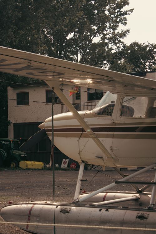 Free Classic floatplane resting at a rustic airfield in Montreal, QC, Canada. Stock Photo