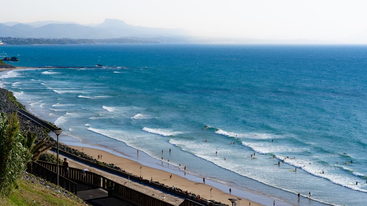 The Côte des Basques from above, wave lines and La Rhune on the horizon