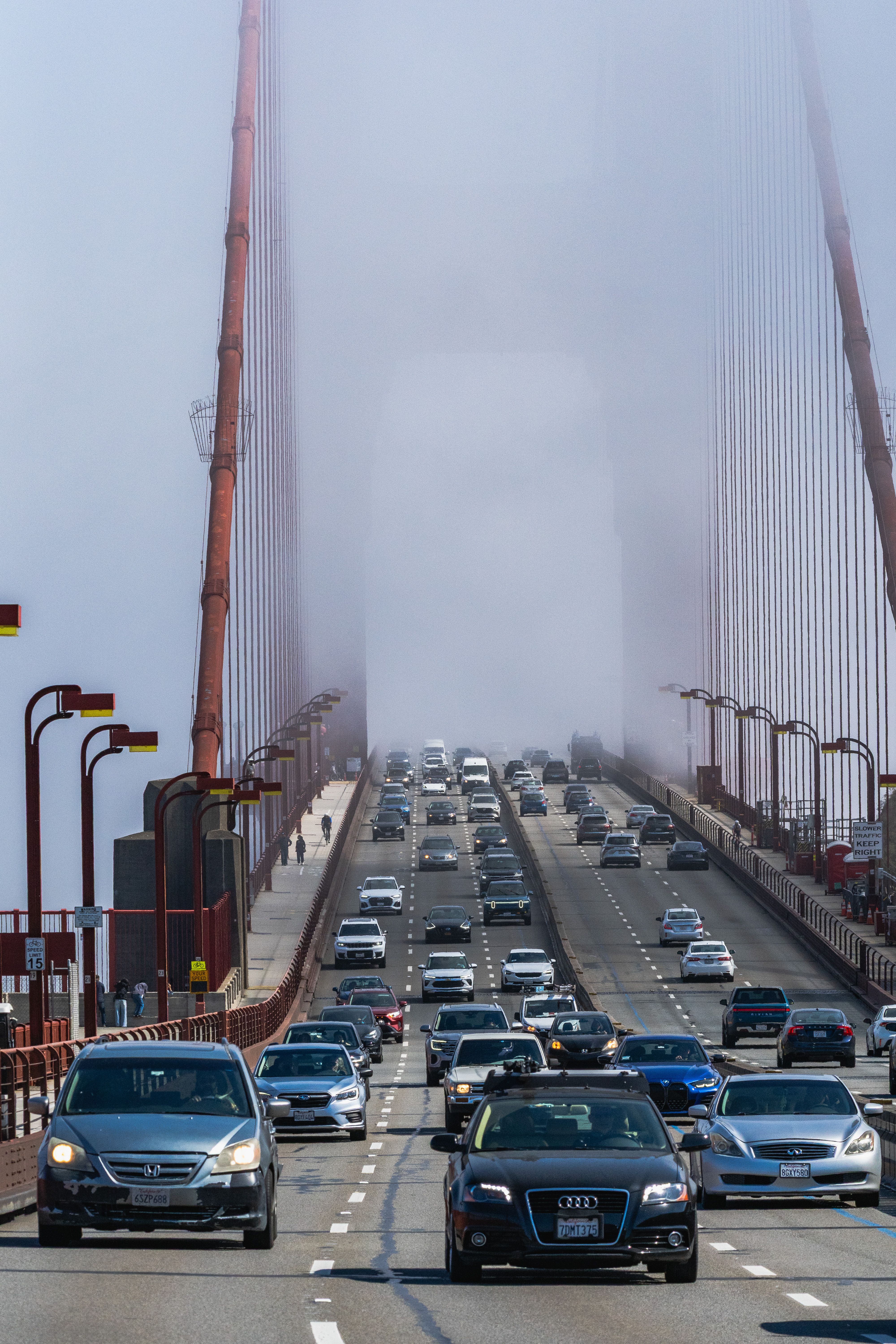 Busy Traffic on Golden Gate Bridge in Fog · Free Stock Photo