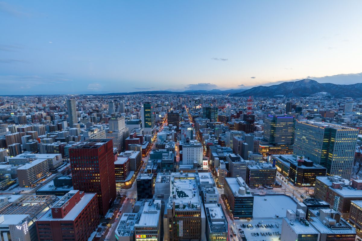 Sapporo cityscape with mountains in the background, Hokkaido, Japan