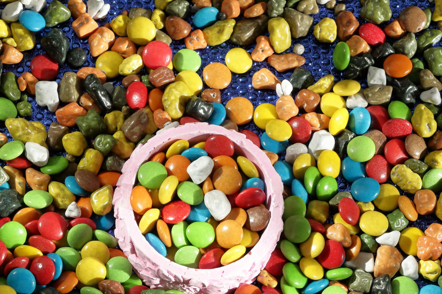 Close-up of peanut butter M&M flavor in hand