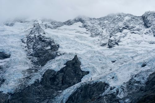 Free Stunning ice formations on Aoraki / Mount Cook, showcasing New Zealand's natural beauty. Stock Photo